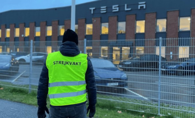 Striker outside Tesla factory
